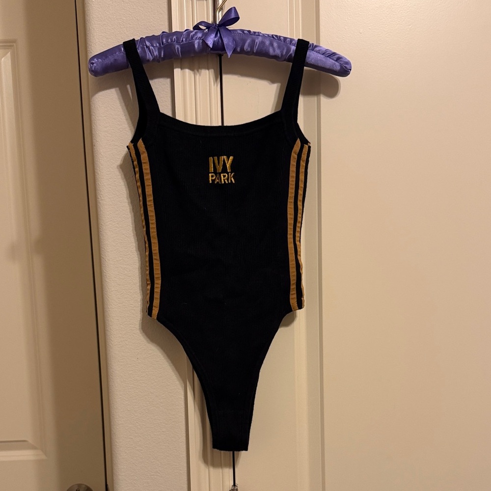 IVY PARK Bodysuit in Black with Gold Stripes